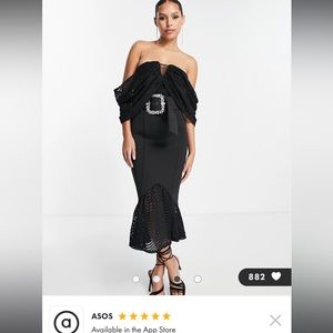 Woman’s black Bardot wiggle lace dress